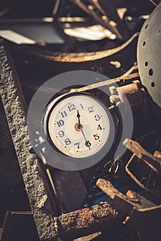 Macro rusty metal parts and old broken clock in sunday flea market