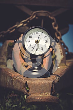 Macro rusty metal parts and old broken clock in sunday flea market