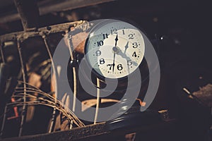 Macro rusty metal parts and old broken clock in sunday flea market