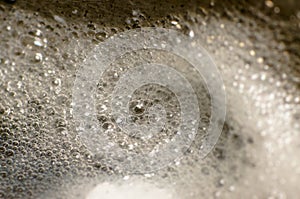 Macro scene of bubble on water in the pot