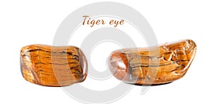 Macro shooting of natural gemstone. Mineral tiger eye, South Africa. Isolated object on a white background.