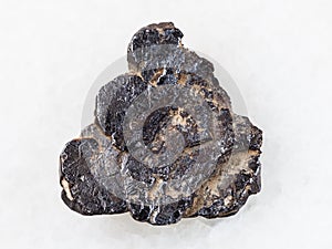 Ilmenite stone on white photo