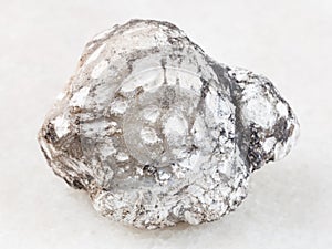 native cacholong stone on white photo