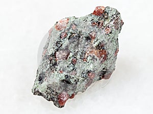 raw eclogite stone on white photo