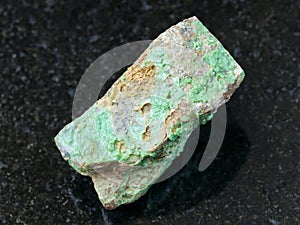 raw Garnierite (nickel ore) stone on dark