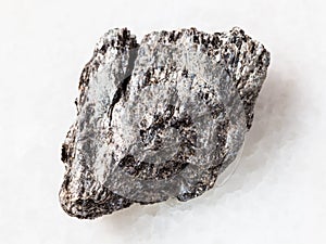 raw quartz-biotite schist stone on white photo