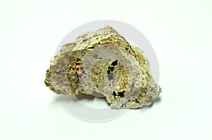 Macro shooting a piece of Phosphate natural mineral rock isolated on white background.
