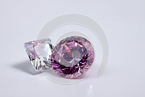 Macro shoots of pink color round shaped shiny diamond