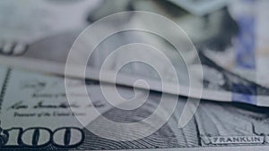 Macro shot of a 100 dollar. Hundred-dollar bills close-up