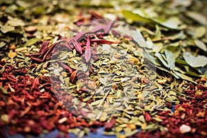 macro shot of assorted tea leaf mix for blending