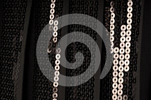 Close-Up of Black Sequins on Fabric