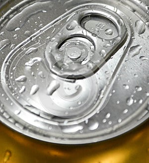 Macro shot of can with water drops