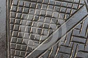 Macro shot of Carvings in metal hand made with chisel, decorations on a tray