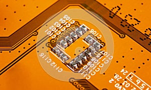 Macro shot of Circuit board with resistors microchips and electronic components. Computer hardware technology. Integrated communic