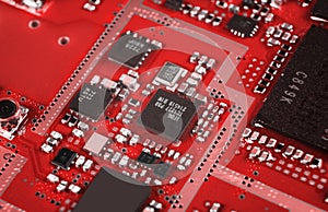 Macro shot of Circuit board with resistors microchips and electronic components. Computer hardware technology. Integrated communic