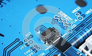 Macro shot of Circuit board with resistors microchips and electronic components. Computer hardware technology. Integrated communic