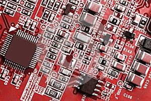 Macro shot of a Circuitboard with resistors microchips and electronic components. Computer hardware technology. Integrated communi