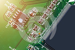 Macro shot of a Circuitboard with resistors microchips and electronic components. Computer hardware technology. Integrated communi