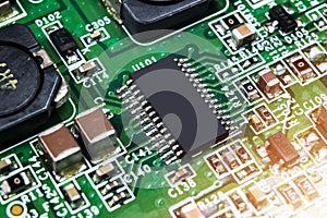 Macro shot of a Circuitboard with resistors microchips and electronic components. Computer hardware technology. Integrated communi