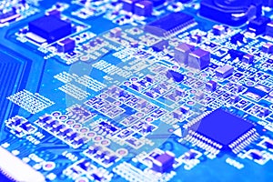 Macro shot of a Circuitboard with resistors microchips and electronic components. Computer hardware technology. Integrated communi