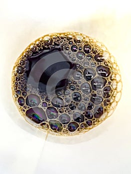 Macro Shot of Coffee Bubbles with Foam Texture