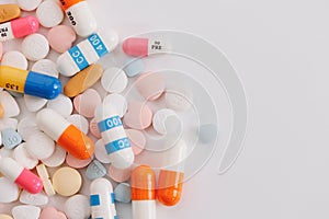 Macro Shot of colour Pills and Capsules During Production and Packing Process on Modern Pharmaceutical Factory. Tablet and Capsule