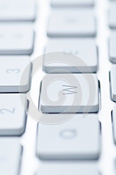 Macro shot of a computer keyboard key with bokeh effect