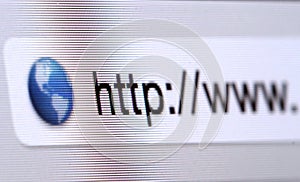 Macro shot of computer screen with http:// address bar and web