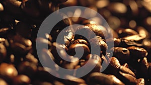 Macro shot of cup with hot coffee on roasted coffee beans in 4K