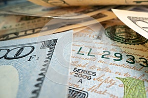 Macro shot of dollars. Stack of one hundred dollar bills close-up.