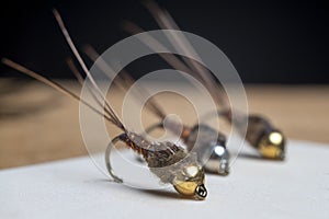 Macro shot of fly fishing lure, hand made fishing fly, fly for fishing