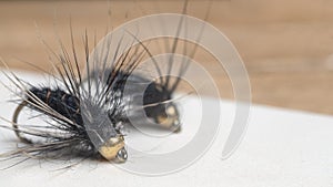 Macro shot of fly fishing lure, hand made fishing fly, fly for fishing