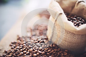 macro shot of fresh coffee beans in a burlap sack