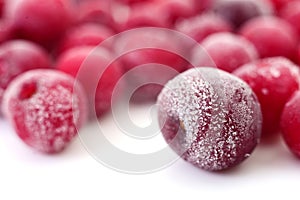 Macro shot of frozen cherries with ice crystals