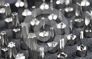 Macro shot mechanics tool set texture background.  Macro shot mechanics tool kit pattern. Set of working tools and bits.