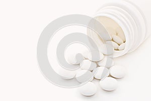 Macro shot of medical tablets with vial