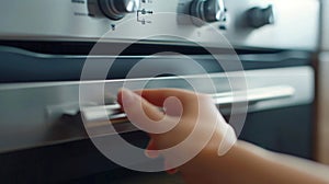 Macro shot of the microwaves touchsensitive buttons with a finger pressing down on one of them photo