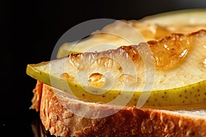 macro shot of pear slice on toasted bread