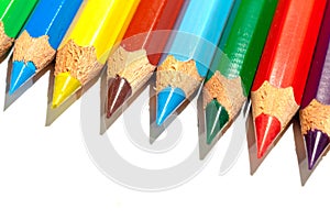 Macro shot of pencils on white background.