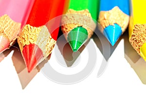 Macro shot of pencils on white background.