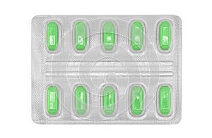 Macro shot pile of tablets pill in silver blister packaging isolated on white background. Aluminium foil blister pack. Pharmacy