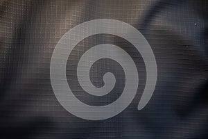 High-Tech Black Ripstop Fabric Texture Close-Up