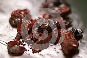 Macro shot of pure telluride element crystals on a table.