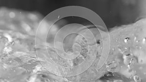 Macro shot of Pure Water Poured Into Glass