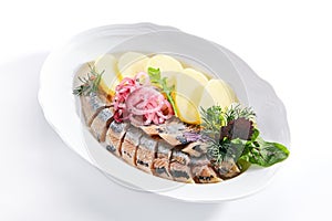 Raw Salted Soused Herring with Onions and Potato Isolated