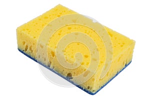 Macro shot of a surface of plastic yellow sponge isolated on white background. Close-up texture. Yellow scrub sponge. Sponge textu