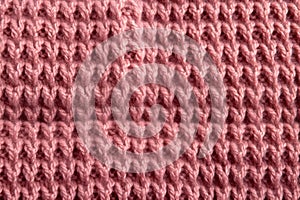 macro shot of the texture of a machine-knit wool sweater