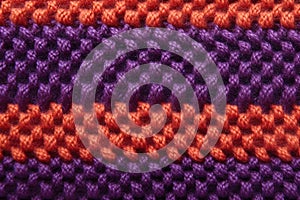 macro shot of the texture of a machine-knit wool sweater