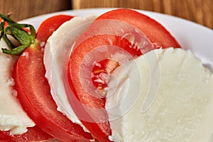 Macro shot of tomato mozzarella caprese salad