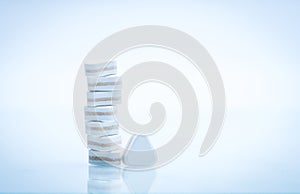 Macro shot of triangle shape tablet pills. Three layers tablet